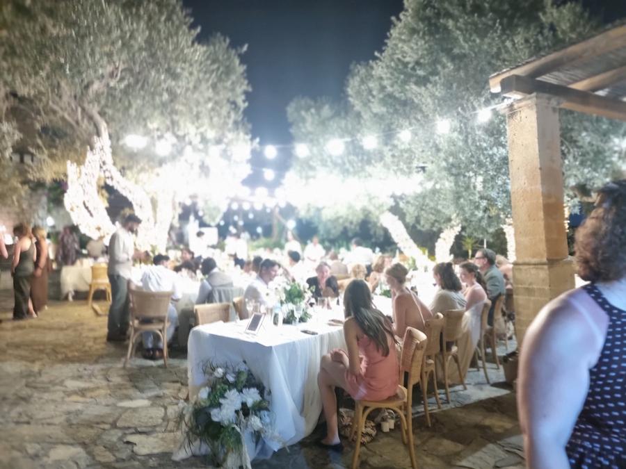 An evening family celebration lit by warm light